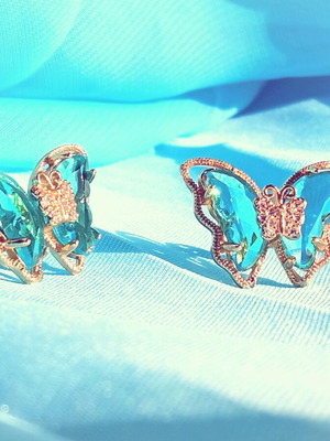 Butterfly stud earrings with blue rhinestones, new