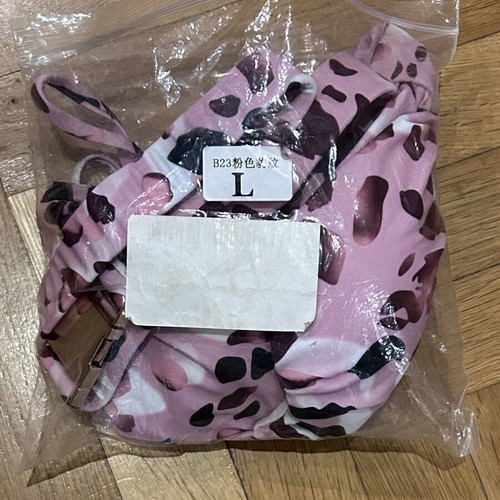 One-piece swimsuit new, fantastic color, size large with belt