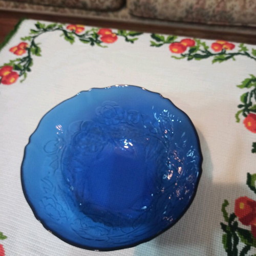 Blue glass salad bowl like new with embossed flowers