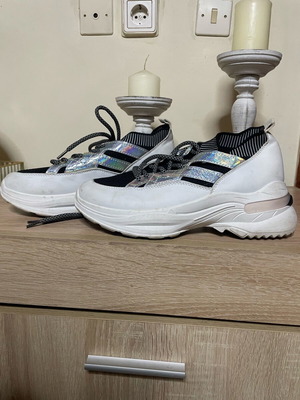 Snickers women's size 38 athletic shoes used, black and white