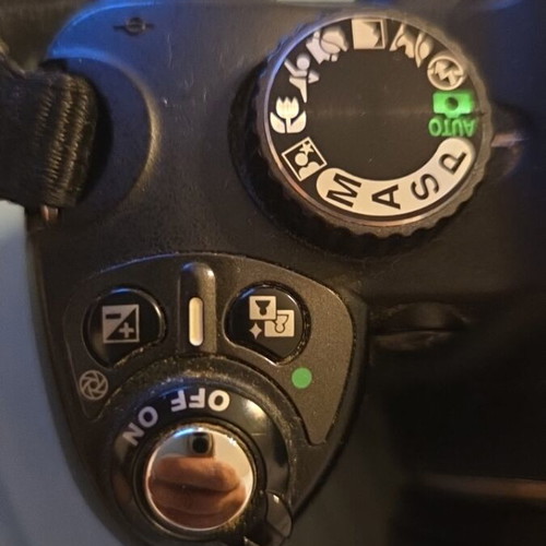 Nikon DSLR model D60 camera used with Nikon Aspherical lens