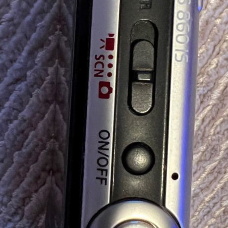 Canon digital camera used with case and charger