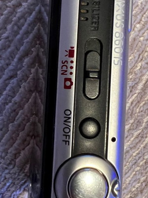 Canon digital camera used with case and charger