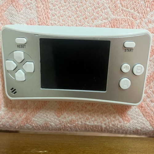 Retro handheld electronic game like new, 4 game types