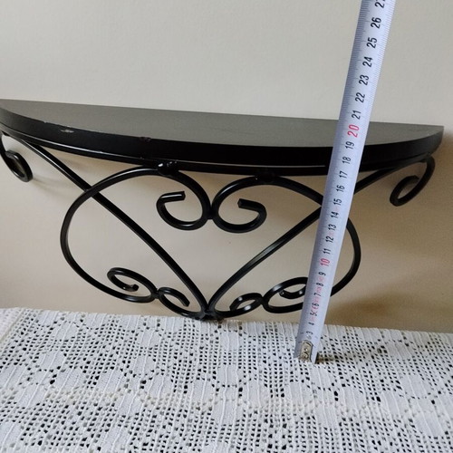 Wall shelf with black metal frame and wooden top, like new