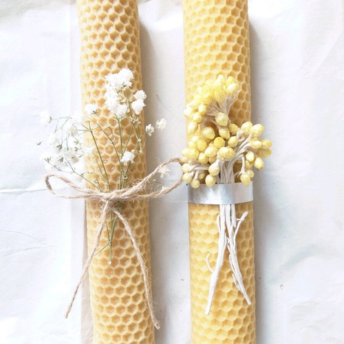 Pair of handmade candles with beeswax and natural decoration new