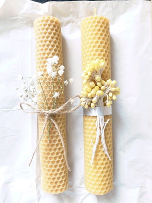Pair of handmade candles with beeswax and natural decoration new
