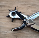Hole punch tool for belts and other materials