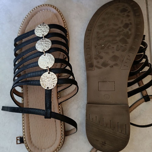 Black sandals with gold details like new