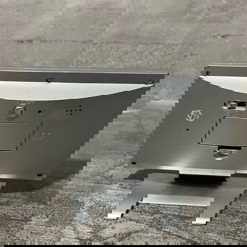 Digital table clock used with alarm and thermometer