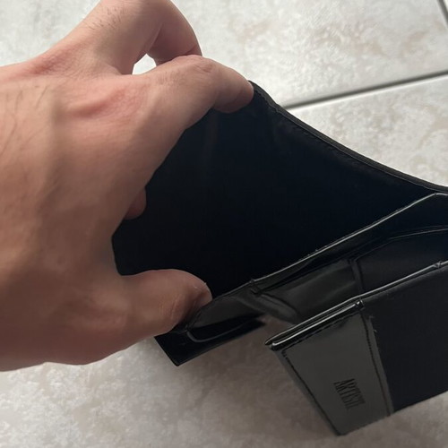 Women's black wallet like new with textured surface