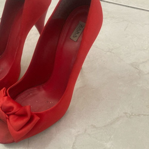 Red heels used size 40