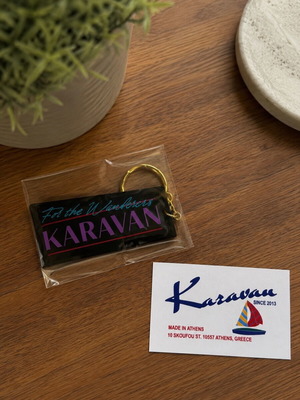 Karavan keychain new with gold ring and sticker