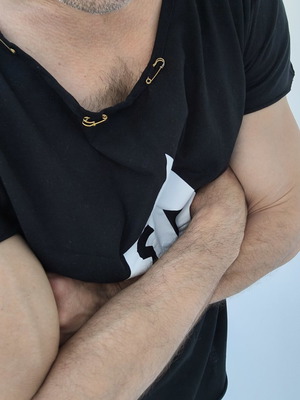 Black t-shirt with safety pins on collar and Bastouni 13 print like new