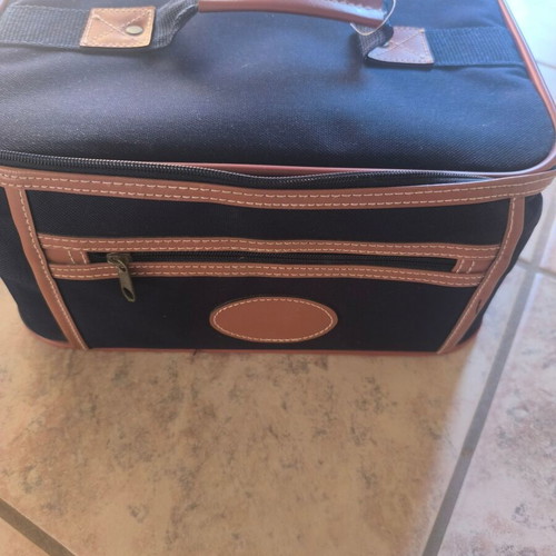 Cosmetic bag like new, blue and brown