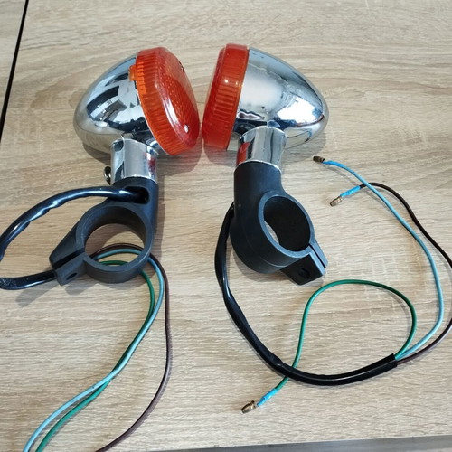 Motorcycle turn signals new with chrome base and orange cover