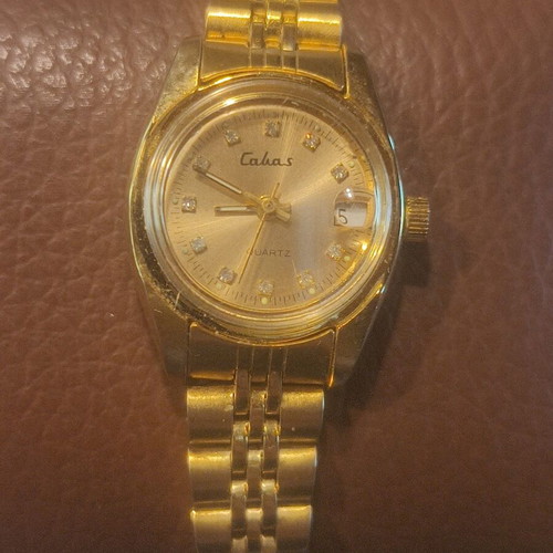 Calbas vintage ladies quartz watch, gold tone, date display