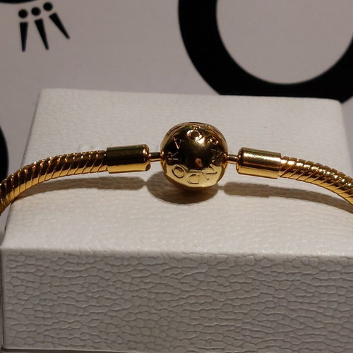 Pandora bracelet size 18 cm, gold plated with round clasp