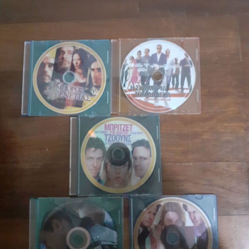 DVD pack of 5 movies like new in colored plastic case
