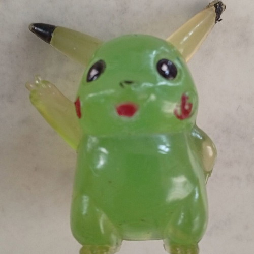 Vintage Pikachu figure miniature, clear green bootleg