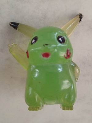 Vintage Pikachu figure miniature, clear green bootleg