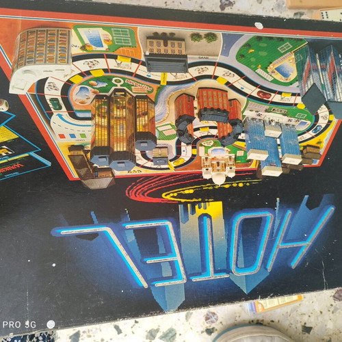 Hotel board game used, with missing pieces