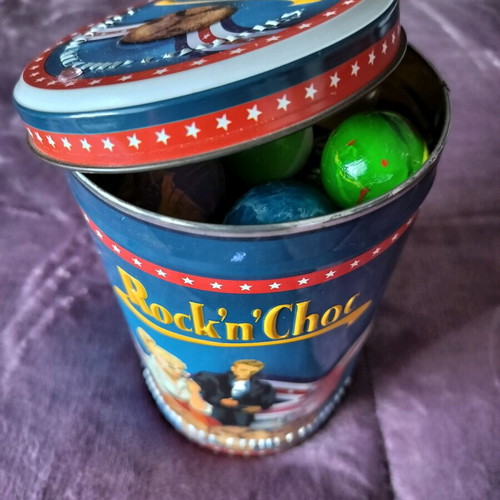 Collection of marbles in metal vintage box like new