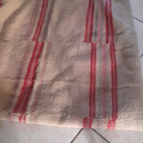 Kilim used light with fringes brown with red stripes