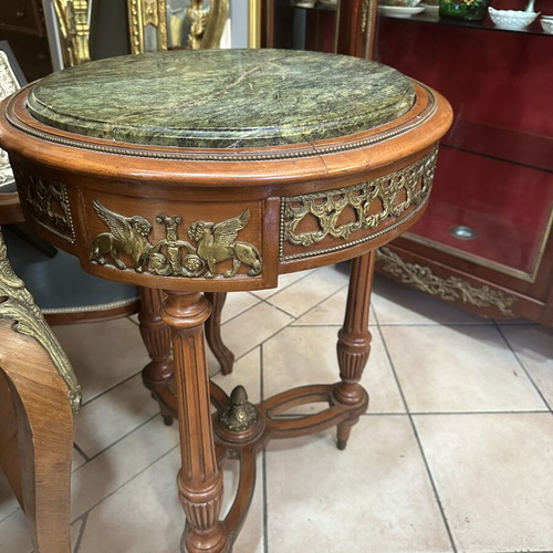 Table with bronze details and marble top used