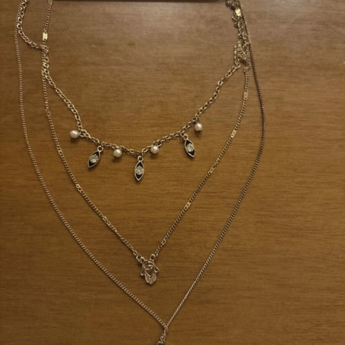 Triple necklace unified in gold tone new