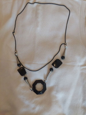 Statement necklace with black chain and industrial details like new