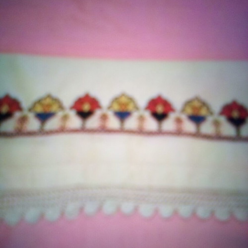 Decorative embroidered towel used, cotton with colorful flowers