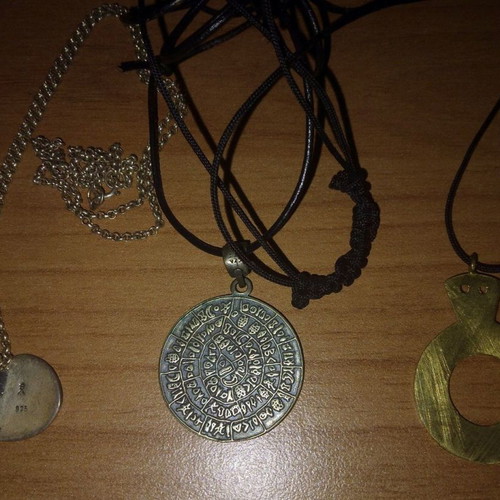 Archaeological-themed pendants pack of 3 in excellent condition