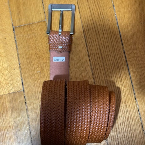 Leather belt like new in tanned color with embossed design 130cm