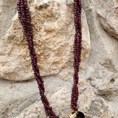 Vintage multilayer necklace with genuine garnet and gold-plated clasp