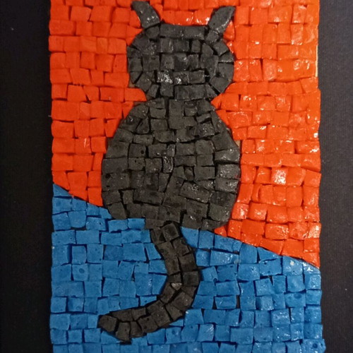 Mosaic framed artwork with black cat design