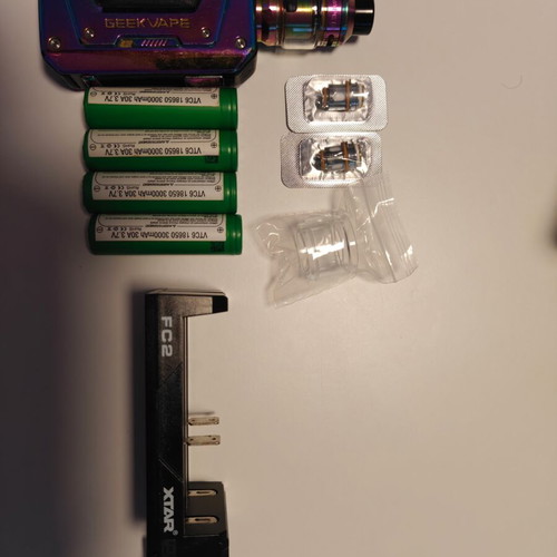 Geekvape used with charger, batteries, and atomizers