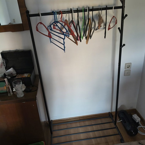 Clothes Rack with Hanger and Wheels like new