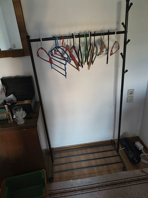 Clothes Rack with Hanger and Wheels like new