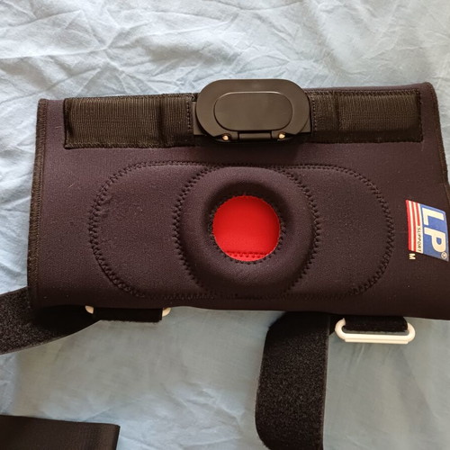 Orthopedic Knee Brace LP Support Medium, like new with metal hinges