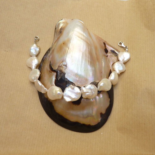 Bracelet with white baroque pearls on Japanese steel wire, silver 925, new