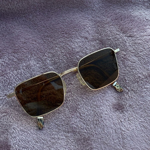 Gigi Hadid sunglasses authentic new gold with case and cloth