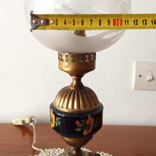 Vintage table lamp with glass shade and decorative metal base used