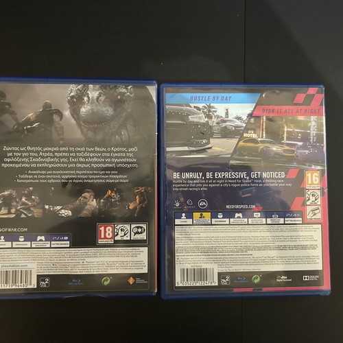 God of War PS4 game with cracked case and Need for Speed Heat