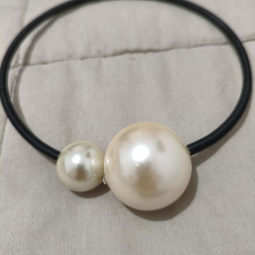 Choker necklace with two asymmetrical pearls used, black elastic band