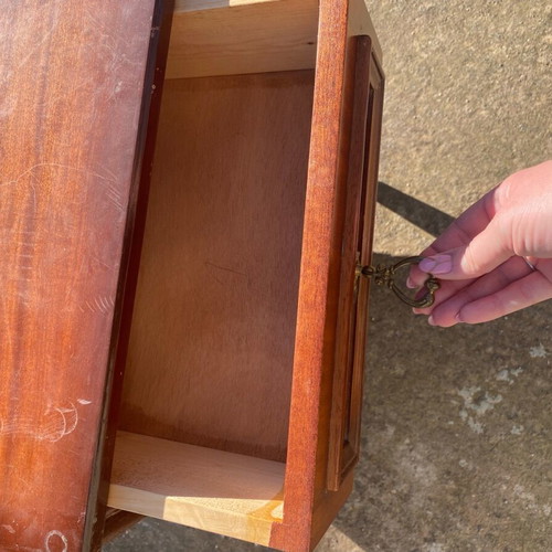Wooden bedside cabinet used with drawer and cupboard