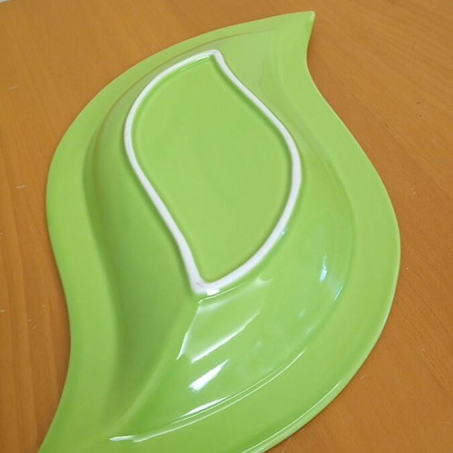 Porcelain green Happy bowl in leaf shape