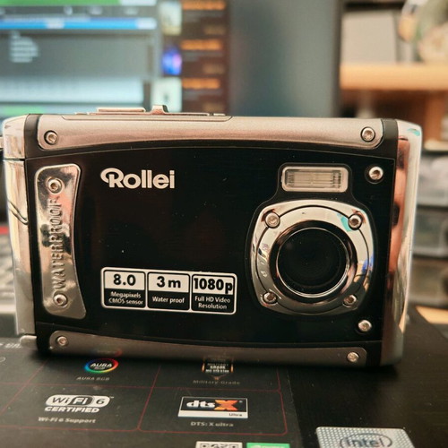 Rollei Sportsline 80 waterproof digital camera used with case and memory card