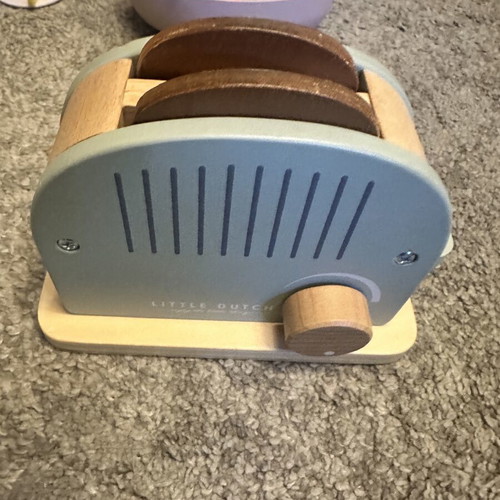 Little Dutch wooden toaster with two wooden bread slices
