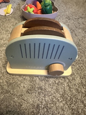 Little Dutch wooden toaster with two wooden bread slices